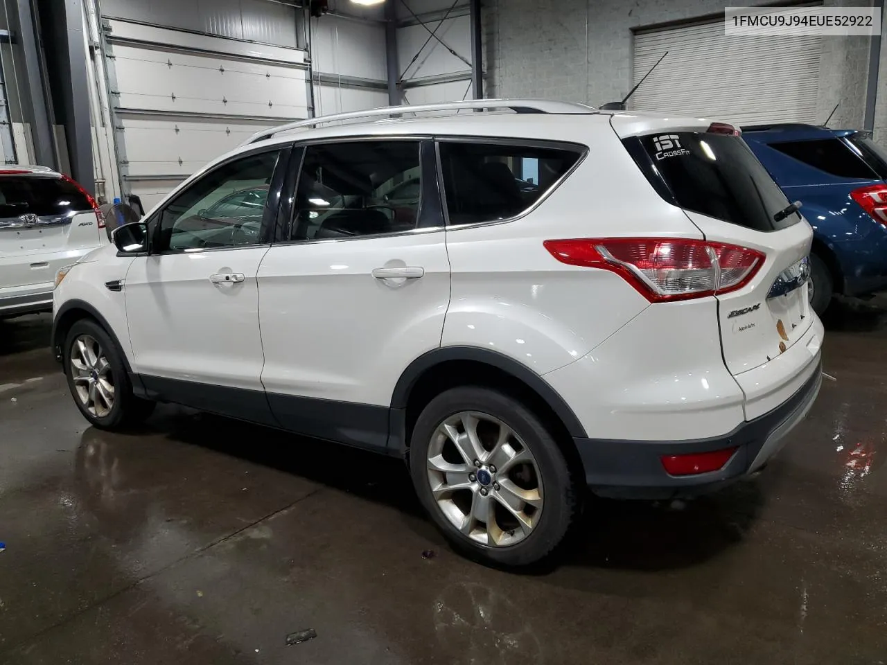 2014 Ford Escape Titanium VIN: 1FMCU9J94EUE52922 Lot: 76987744