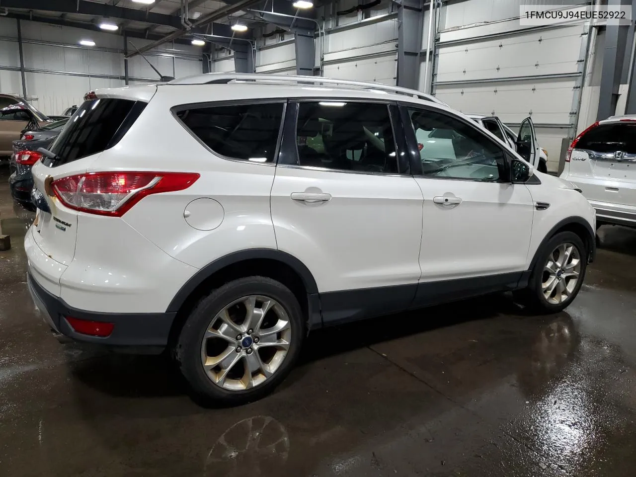 2014 Ford Escape Titanium VIN: 1FMCU9J94EUE52922 Lot: 76987744