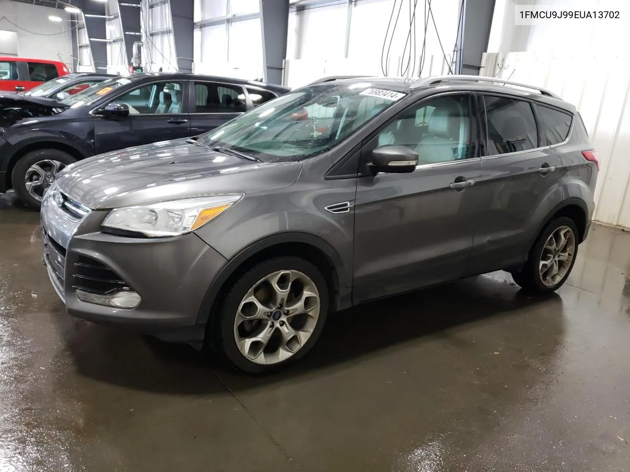 2014 Ford Escape Titanium VIN: 1FMCU9J99EUA13702 Lot: 76989414