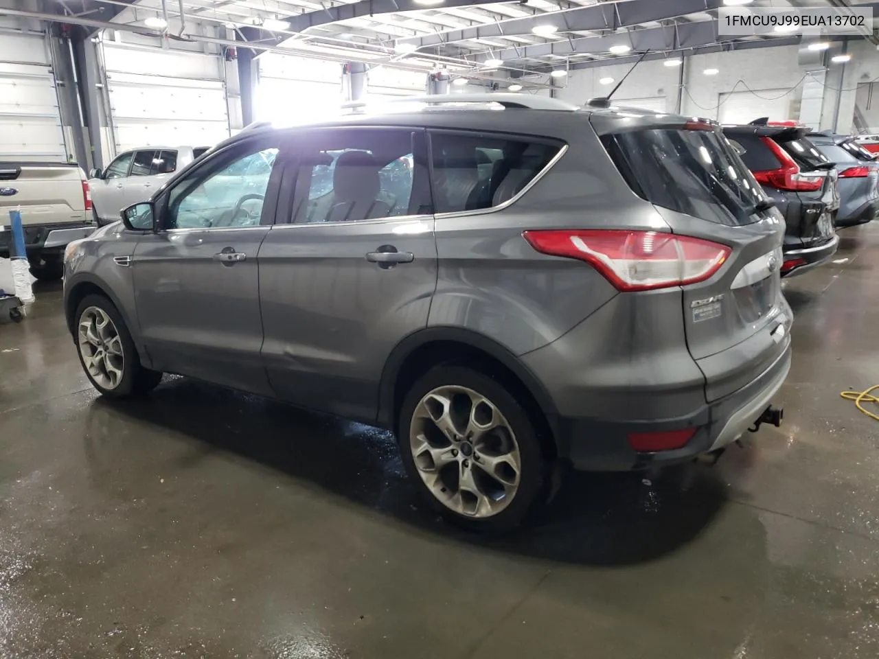 2014 Ford Escape Titanium VIN: 1FMCU9J99EUA13702 Lot: 76989414