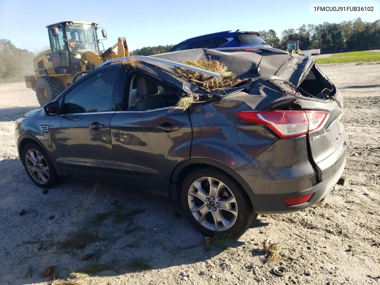 2015 Ford Escape Titanium VIN: 1FMCU0J91FUB36102 Lot: 75084014