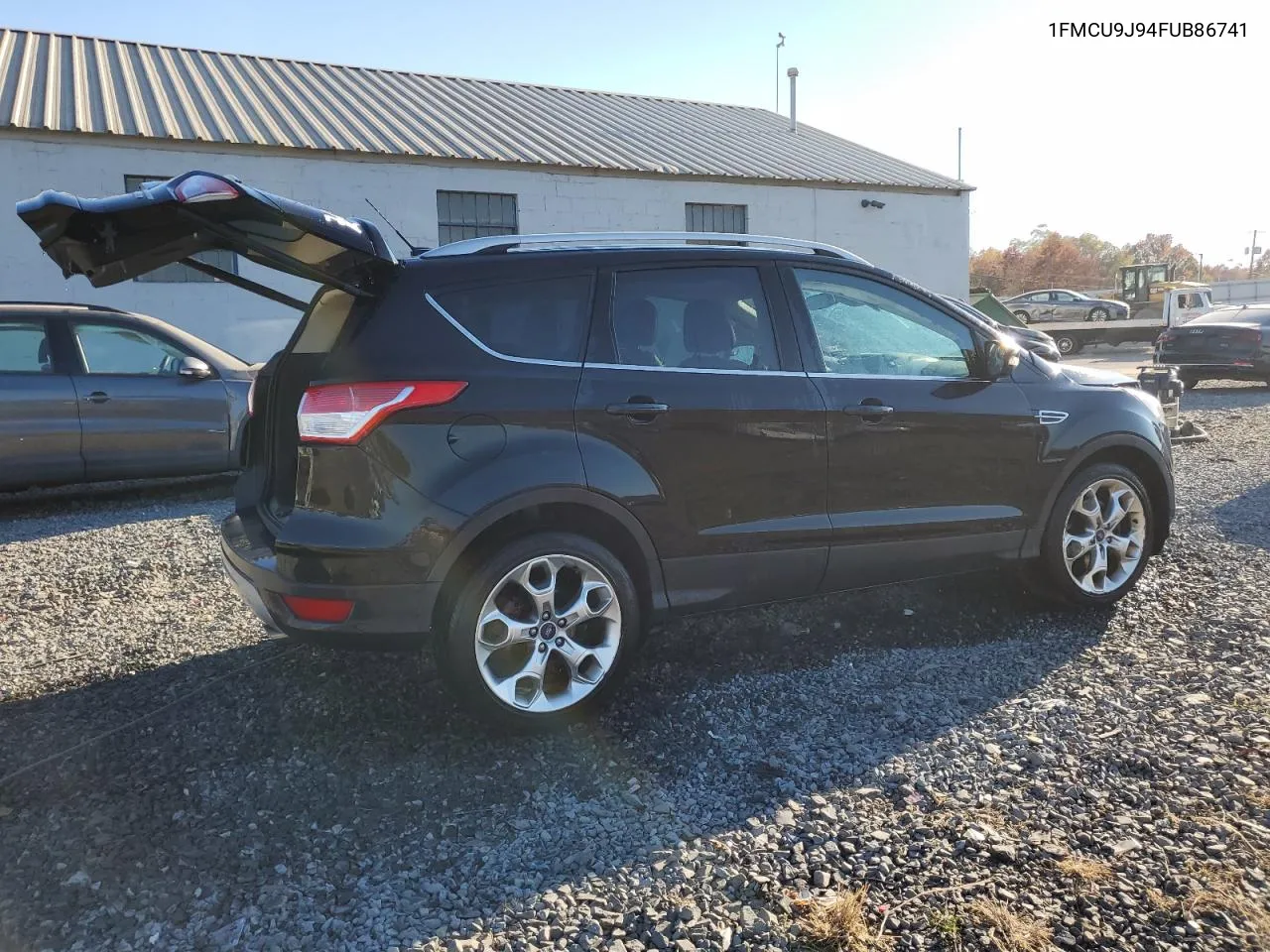 2015 Ford Escape Titanium VIN: 1FMCU9J94FUB86741 Lot: 77198114