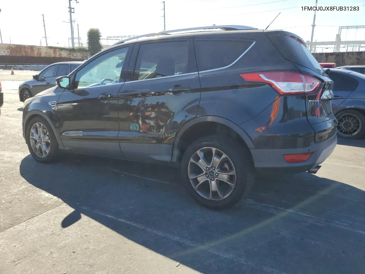 2015 Ford Escape Titanium VIN: 1FMCU0JX8FUB31283 Lot: 77494054