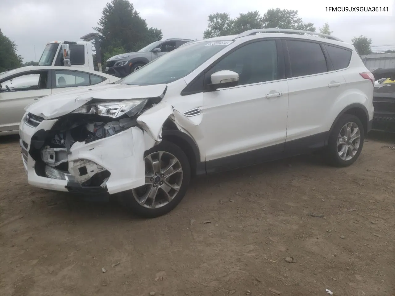 2016 Ford Escape Titanium VIN: 1FMCU9JX9GUA36141 Lot: 57300474