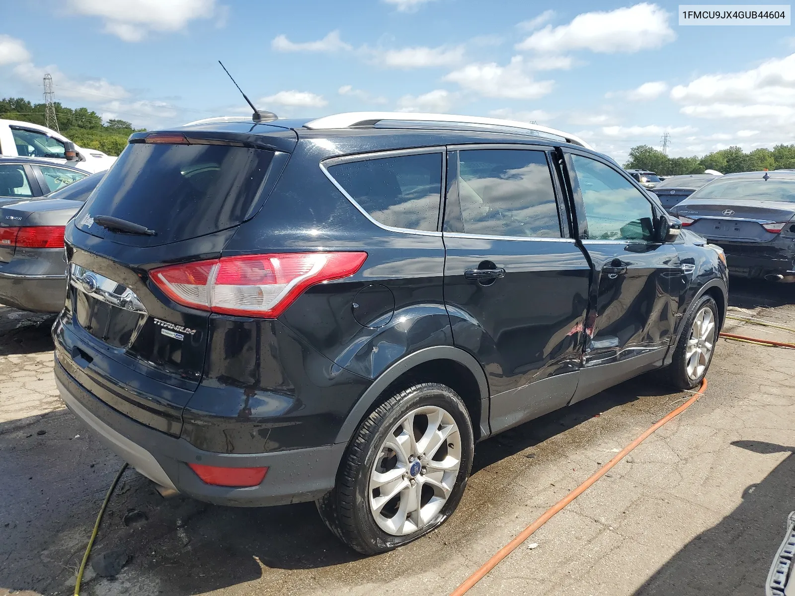 2016 Ford Escape Titanium VIN: 1FMCU9JX4GUB44604 Lot: 67118564