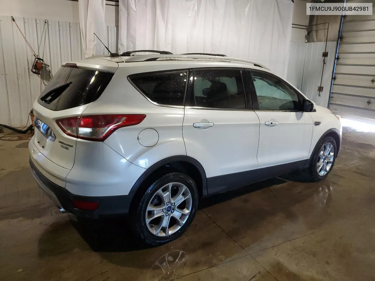 2016 Ford Escape Titanium VIN: 1FMCU9J90GUB42981 Lot: 69590084