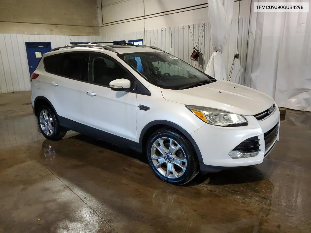 2016 Ford Escape Titanium VIN: 1FMCU9J90GUB42981 Lot: 69590084