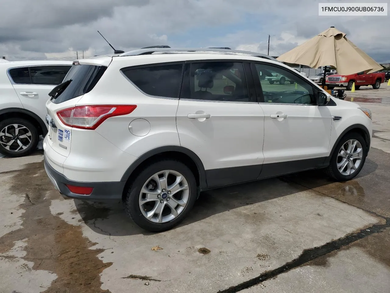 2016 Ford Escape Titanium VIN: 1FMCU0J90GUB06736 Lot: 71218224