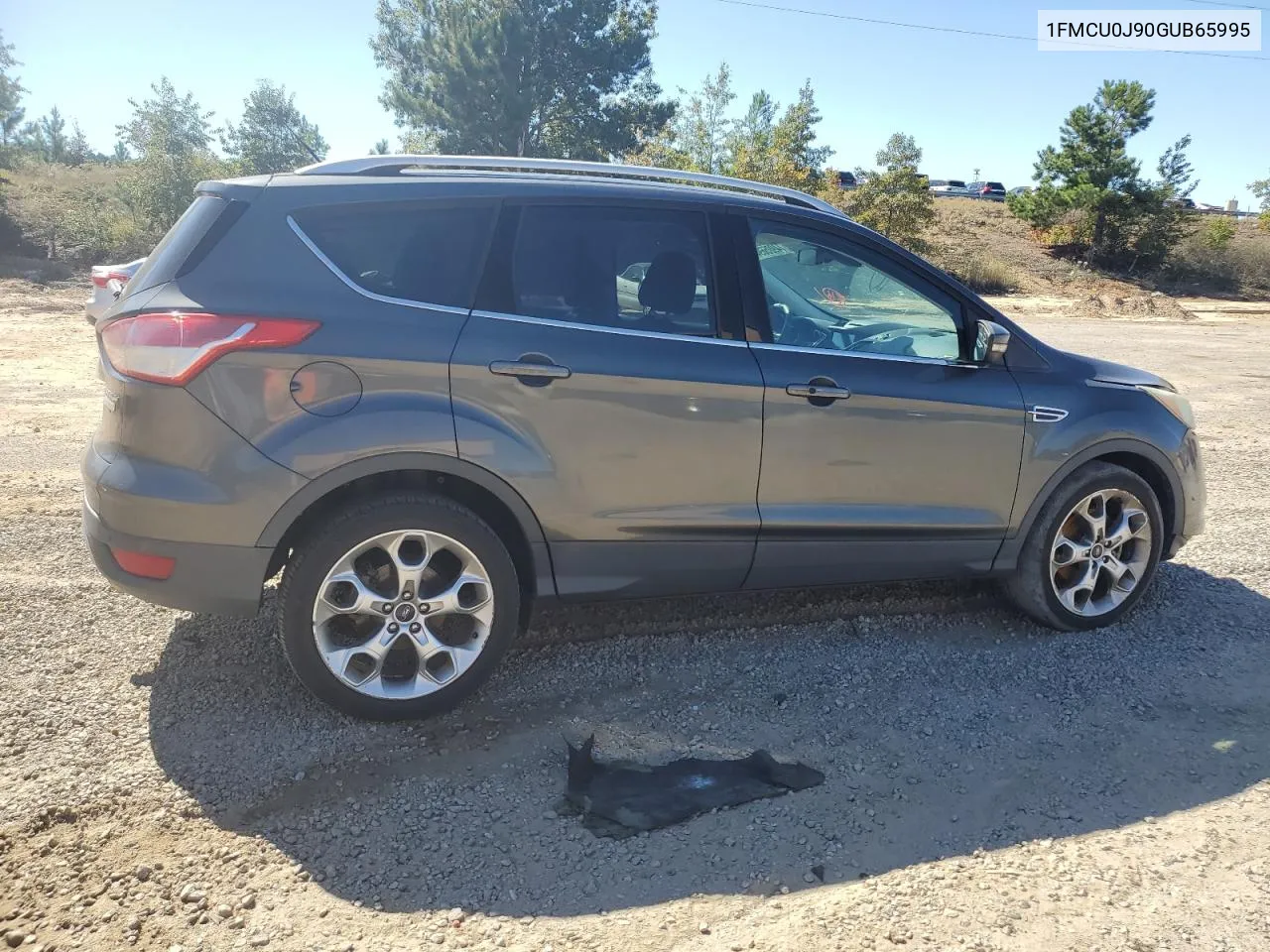 2016 Ford Escape Titanium VIN: 1FMCU0J90GUB65995 Lot: 74905694