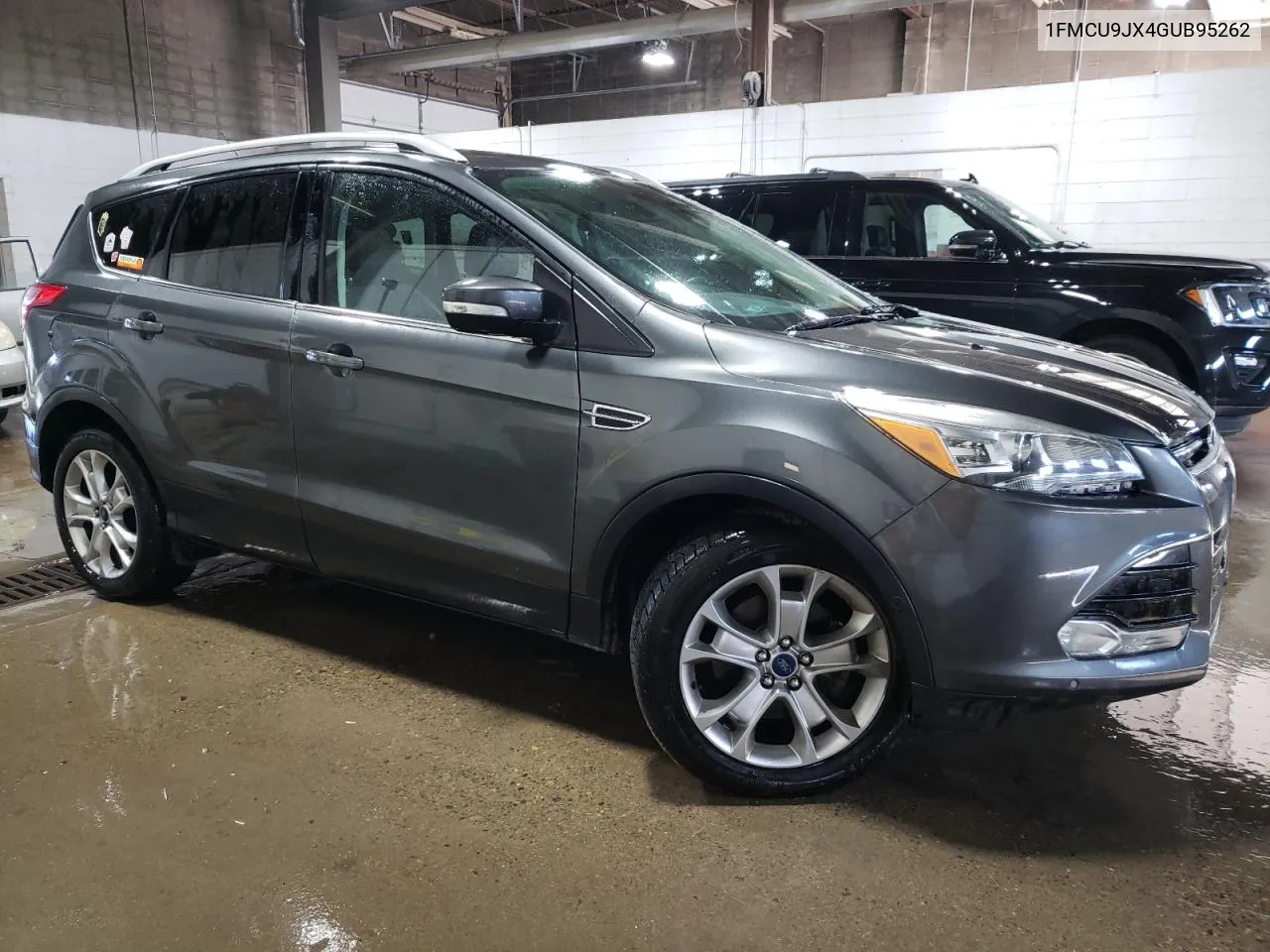 2016 Ford Escape Titanium VIN: 1FMCU9JX4GUB95262 Lot: 75308594