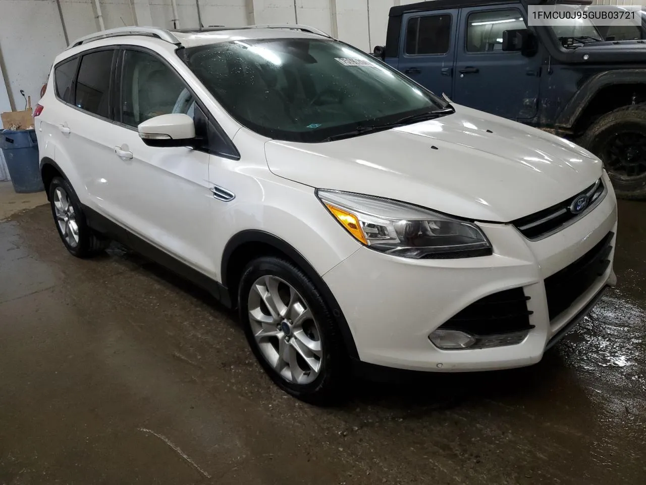 2016 Ford Escape Titanium VIN: 1FMCU0J95GUB03721 Lot: 75699214