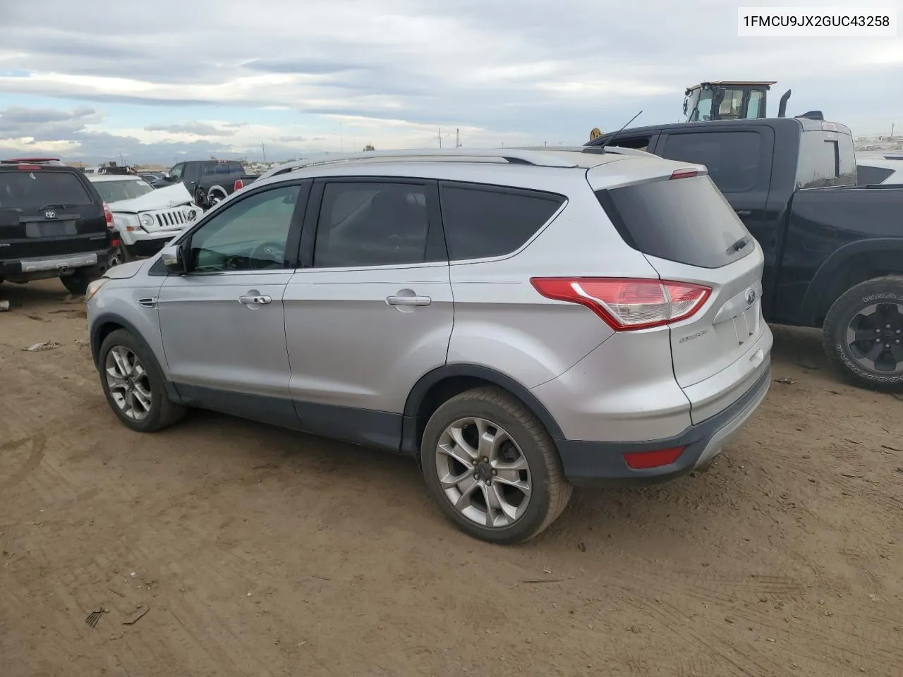 2016 Ford Escape Titanium VIN: 1FMCU9JX2GUC43258 Lot: 76339474