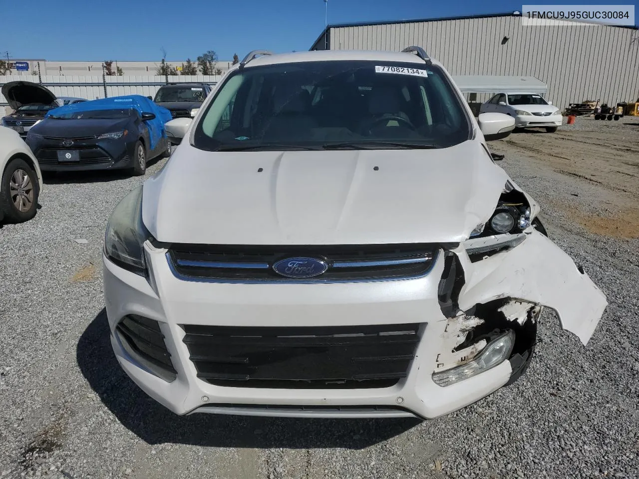 2016 Ford Escape Titanium VIN: 1FMCU9J95GUC30084 Lot: 77082134