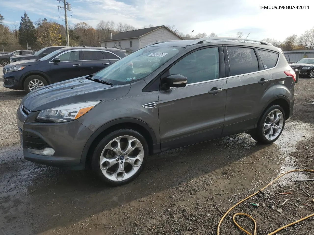 2016 Ford Escape Titanium VIN: 1FMCU9J98GUA42014 Lot: 80784484