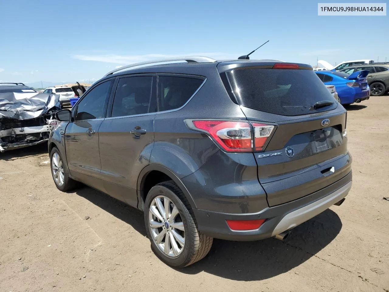 2017 Ford Escape Titanium VIN: 1FMCU9J98HUA14344 Lot: 57050654