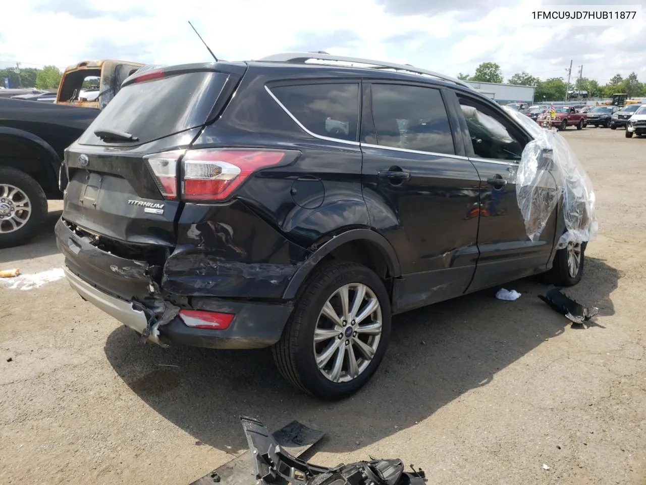 2017 Ford Escape Titanium VIN: 1FMCU9JD7HUB11877 Lot: 60658224