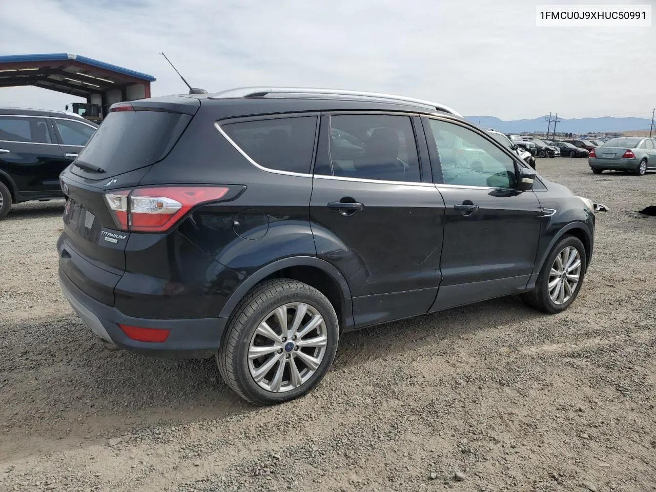 2017 Ford Escape Titanium VIN: 1FMCU0J9XHUC50991 Lot: 73802584