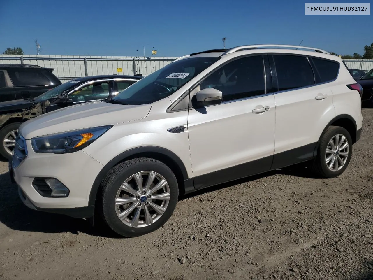 2017 Ford Escape Titanium VIN: 1FMCU9J91HUD32127 Lot: 74800244