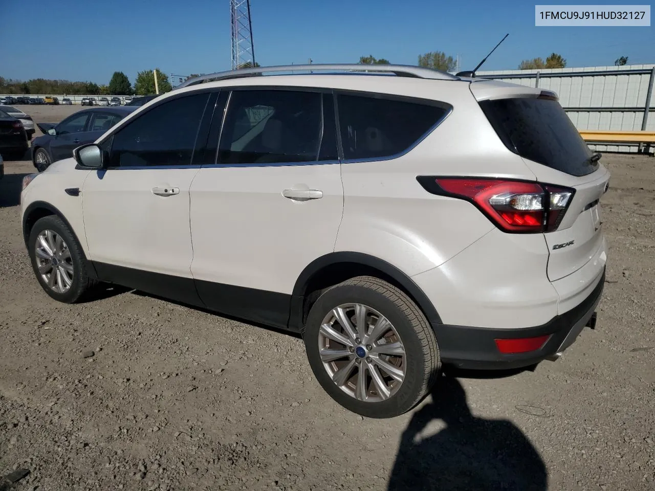 2017 Ford Escape Titanium VIN: 1FMCU9J91HUD32127 Lot: 74800244