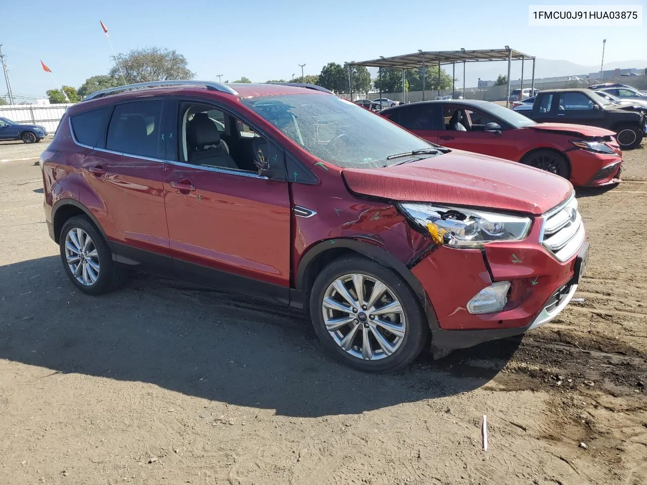 2017 Ford Escape Titanium VIN: 1FMCU0J91HUA03875 Lot: 75860404