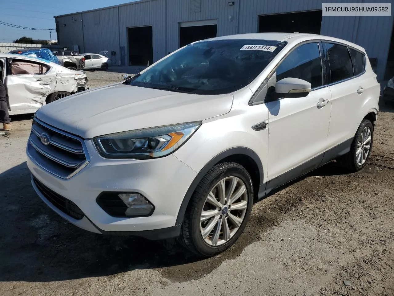 2017 Ford Escape Titanium VIN: 1FMCU0J95HUA09582 Lot: 76011314