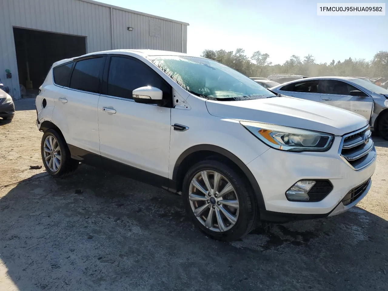 2017 Ford Escape Titanium VIN: 1FMCU0J95HUA09582 Lot: 76011314