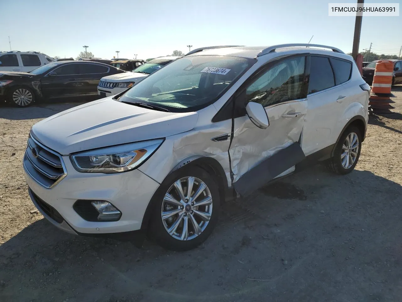 2017 Ford Escape Titanium VIN: 1FMCU0J96HUA63991 Lot: 76723674