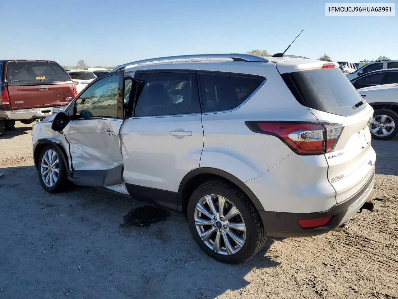 2017 Ford Escape Titanium VIN: 1FMCU0J96HUA63991 Lot: 76723674