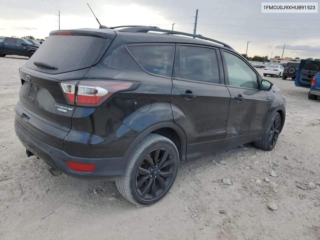 2017 Ford Escape Titanium VIN: 1FMCU0J9XHUB91523 Lot: 76909744