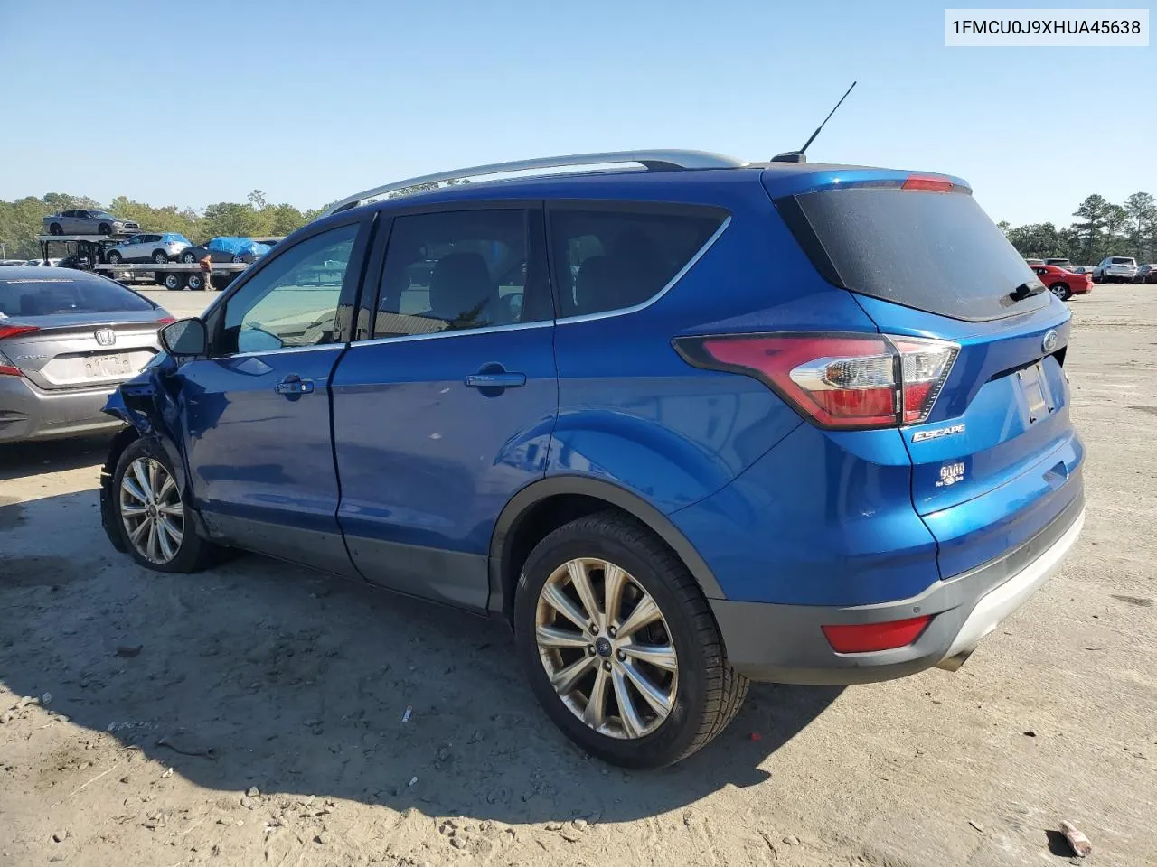 2017 Ford Escape Titanium VIN: 1FMCU0J9XHUA45638 Lot: 77263074