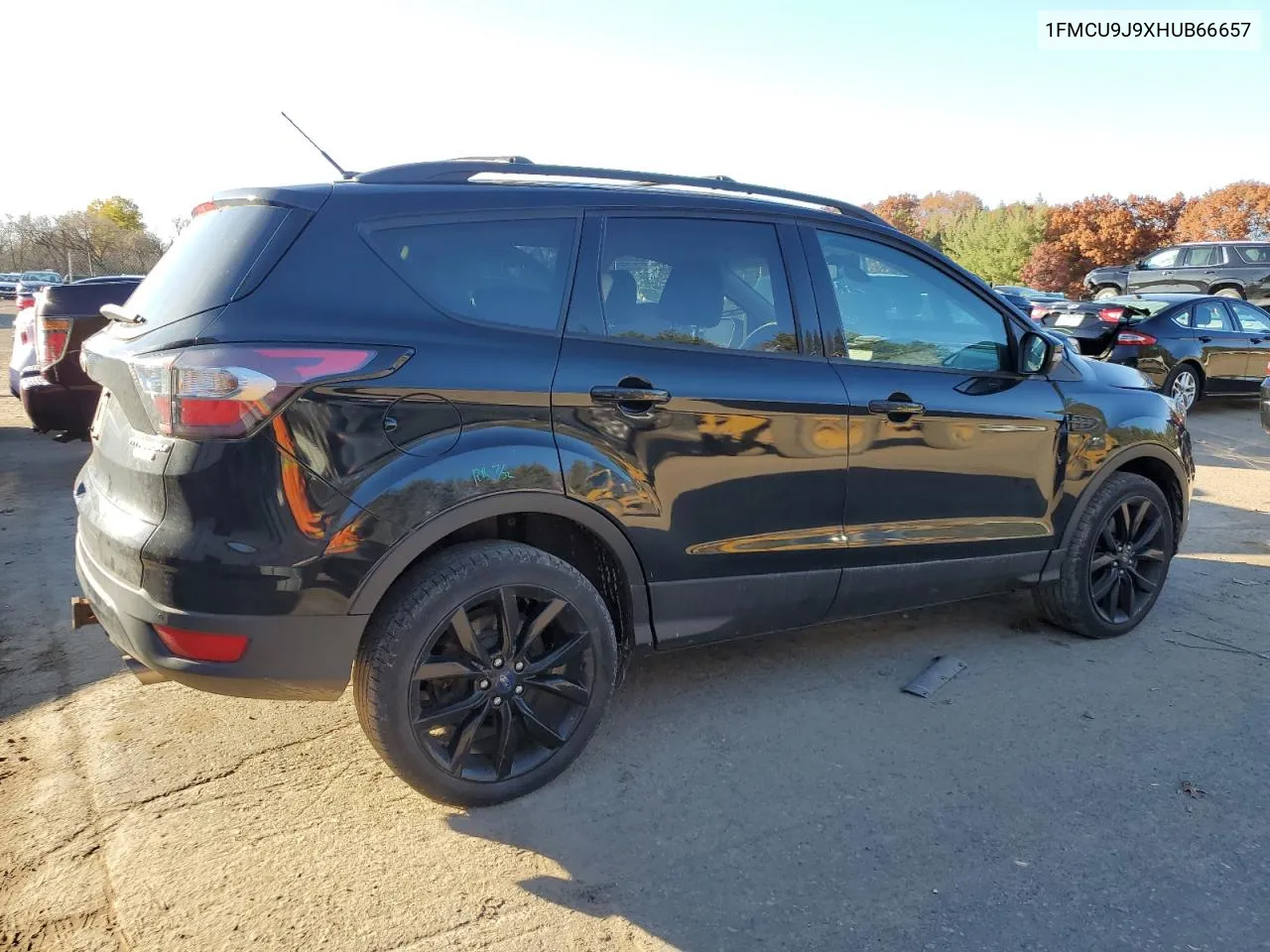 2017 Ford Escape Titanium VIN: 1FMCU9J9XHUB66657 Lot: 77396964