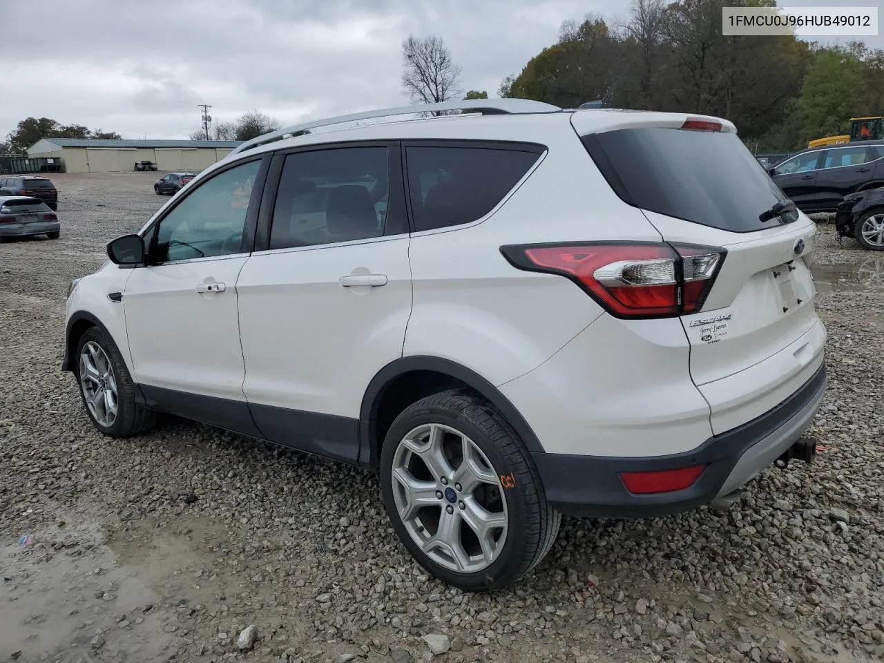 2017 Ford Escape Titanium VIN: 1FMCU0J96HUB49012 Lot: 80907474