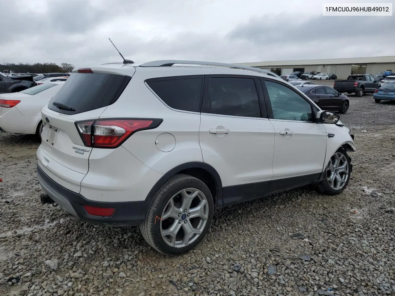 2017 Ford Escape Titanium VIN: 1FMCU0J96HUB49012 Lot: 80907474