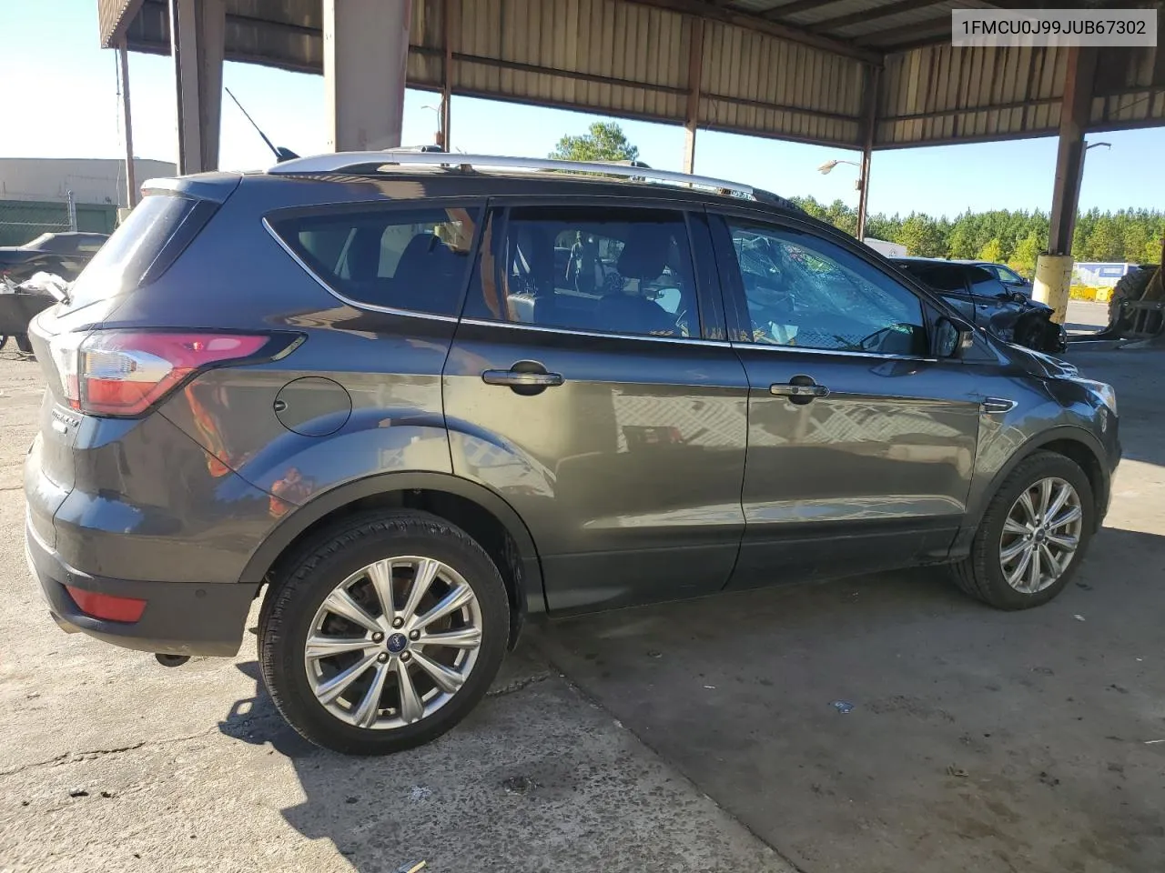 2018 Ford Escape Titanium VIN: 1FMCU0J99JUB67302 Lot: 73644054