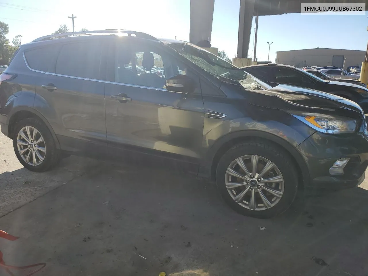 2018 Ford Escape Titanium VIN: 1FMCU0J99JUB67302 Lot: 73644054