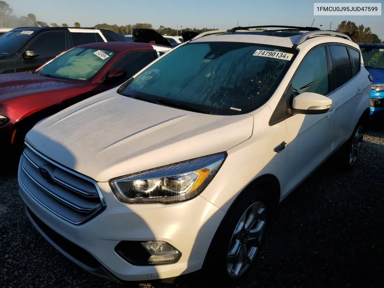 2018 Ford Escape Titanium VIN: 1FMCU0J95JUD47599 Lot: 74790134