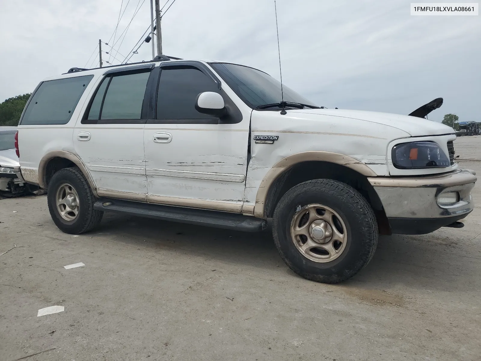 1997 Ford Expedition VIN: 1FMFU18LXVLA08661 Lot: 64061664