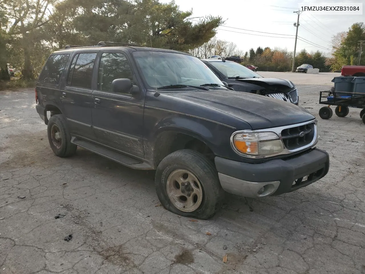 1999 Ford Explorer VIN: 1FMZU34EXXZB31084 Lot: 77824384