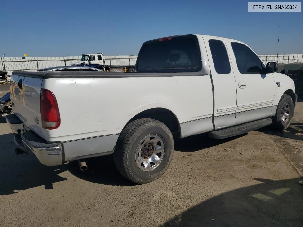 2002 Ford F150 VIN: 1FTPX17L12NA65834 Lot: 71112074