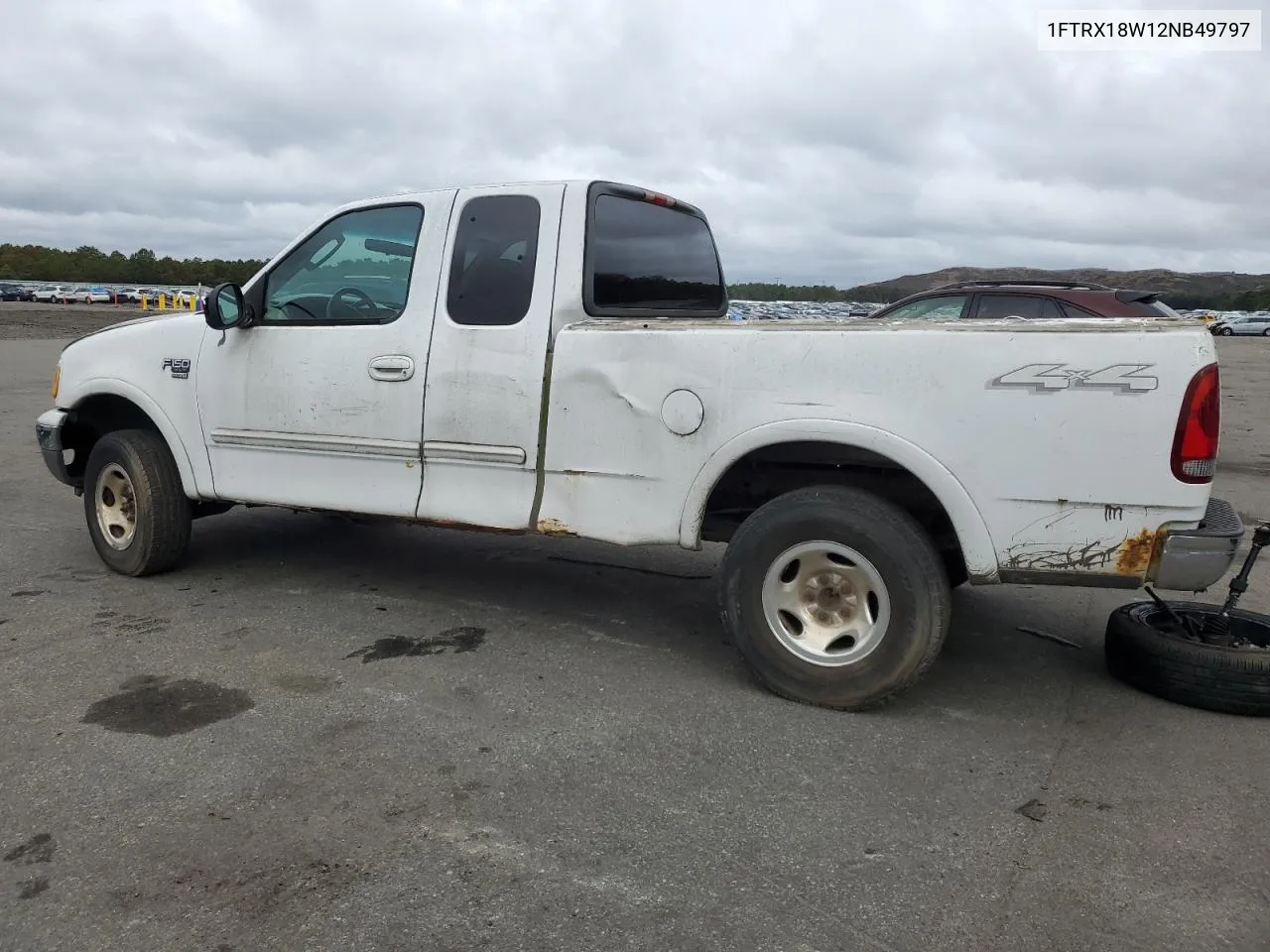 2002 Ford F150 VIN: 1FTRX18W12NB49797 Lot: 73895524