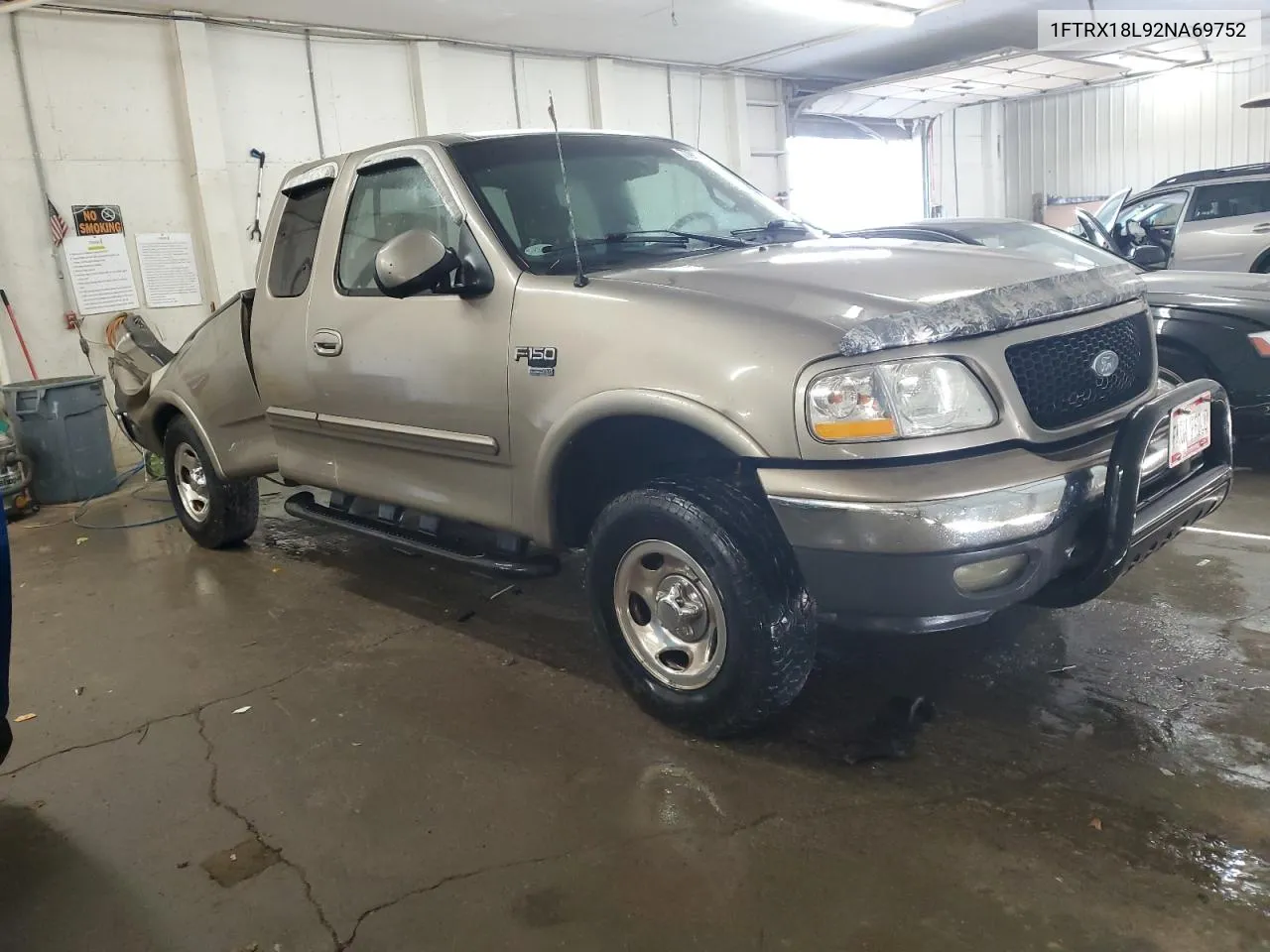 2002 Ford F150 VIN: 1FTRX18L92NA69752 Lot: 77980524