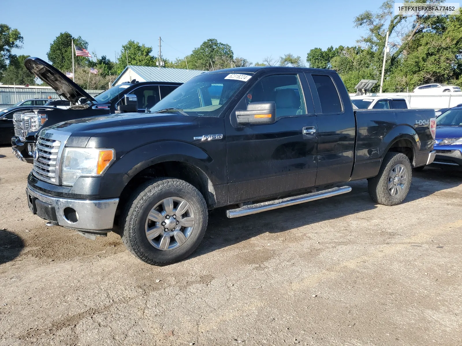 2011 Ford F150 Super Cab VIN: 1FTFX1EFXBFA77452 Lot: 62318224