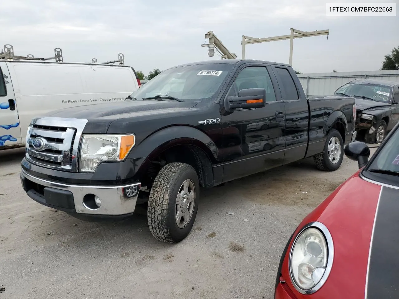 2011 Ford F150 Super Cab VIN: 1FTEX1CM7BFC22668 Lot: 67795224