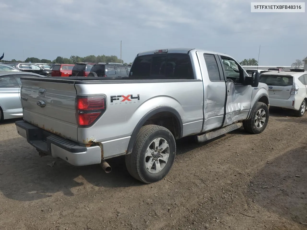 2011 Ford F150 Super Cab VIN: 1FTFX1ETXBFB48316 Lot: 68357154