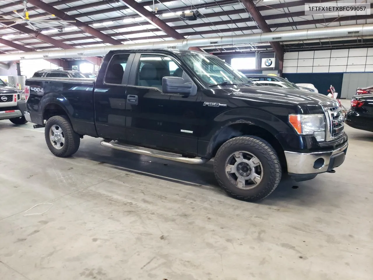 2011 Ford F150 Super Cab VIN: 1FTFX1ETXBFC99057 Lot: 72441474