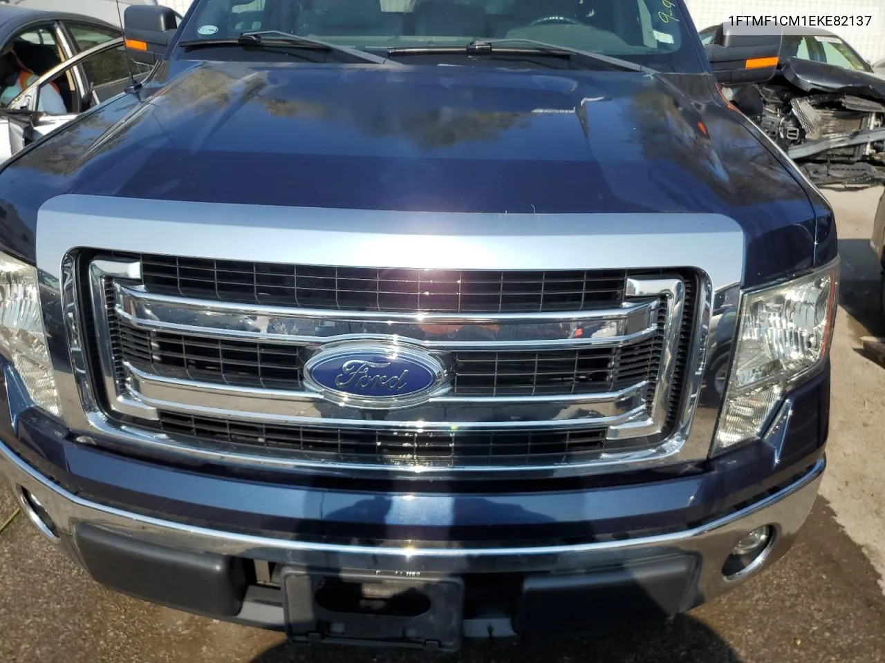 2014 Ford F150 VIN: 1FTMF1CM1EKE82137 Lot: 70802304