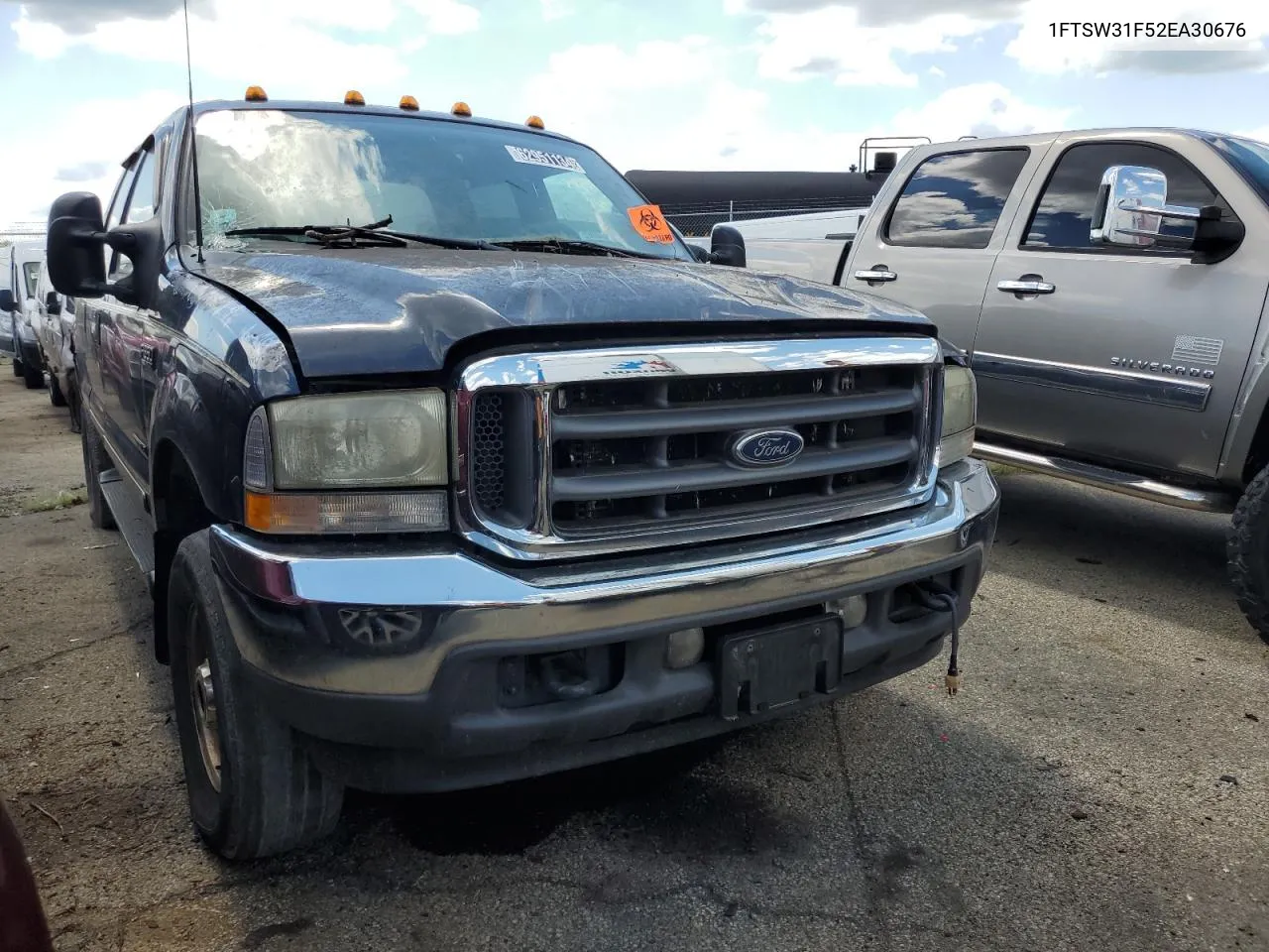 2002 Ford F350 Srw Super Duty VIN: 1FTSW31F52EA30676 Lot: 62951134