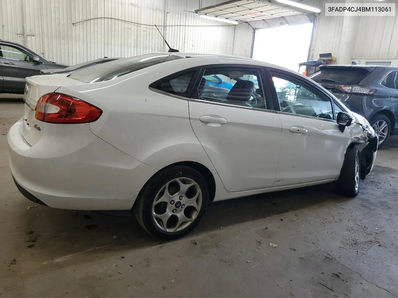 2011 Ford Fiesta Sel VIN: 3FADP4CJ4BM113061 Lot: 73668044