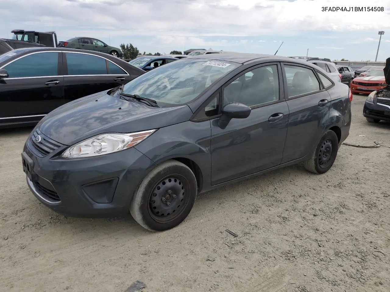 2011 Ford Fiesta S VIN: 3FADP4AJ1BM154508 Lot: 74712424