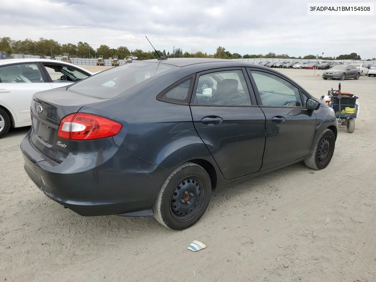 2011 Ford Fiesta S VIN: 3FADP4AJ1BM154508 Lot: 74712424